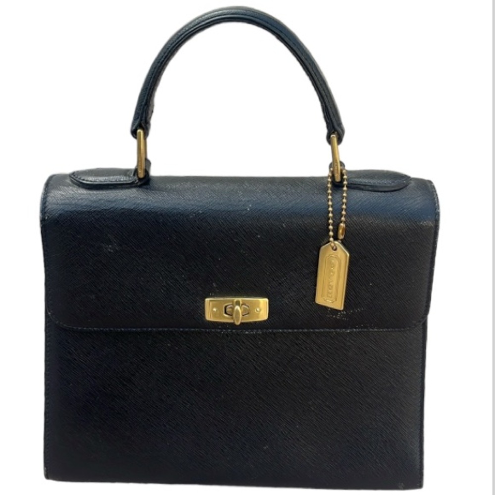 Vintage Coach Gramercy black leather made it Italy.